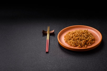 Instant noodles or ramen, Asian food, pasta with vegetables and spices. Noodles, takeaway food, instant mealの写真素材