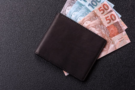Cash paper money of Brazil, notes of different denominations as a conceptual background of...