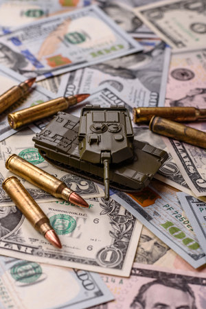 Money, cash dollars to fund weapons for war and defense against attack. Dollars for war as a...