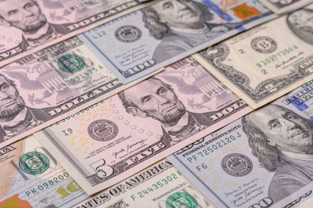 USA money, cash paper dollars, American business and financial transactions. Cash dollars in bills...