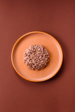 Tuna, canned fish in a can and on a plate for making sandwiches and other food. Canned tuna as an...