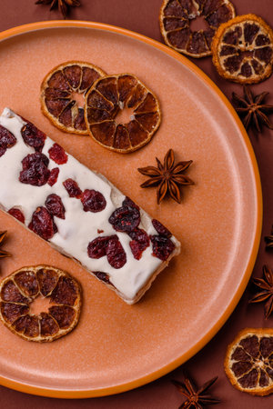 Nougat or white caramel with hazelnuts and pistachios and citrus pieces. White nougat with nuts,...