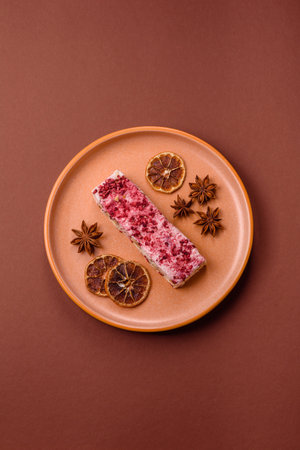 Nougat or white caramel with hazelnuts and pistachios and strawberry pieces. White nougat with nuts,...