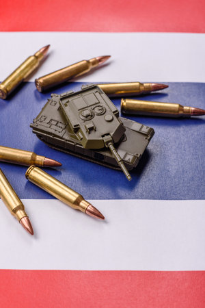Money, cash of Thailand to fund weapons for war and defense against attack. Baht for war as a...
