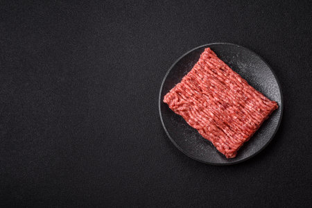 Raw ground beef meat food, ingredient for making cutlets or meatballs. Raw ground beef for your backgroundの写真素材