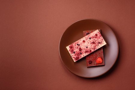 Bar sweet craft artisan chocolate with dried fruits made at home. Craft chocolate as a background for your designの写真素材