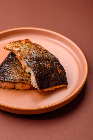 Food, seafood, grilled fish fillet with lemon, salt and spices. Grilled fish fillet for lunch,...