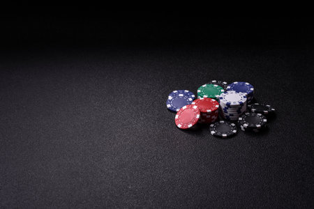 Casino chips, bets and gambling, risk to win or lose money. Betting chips as a background for your...