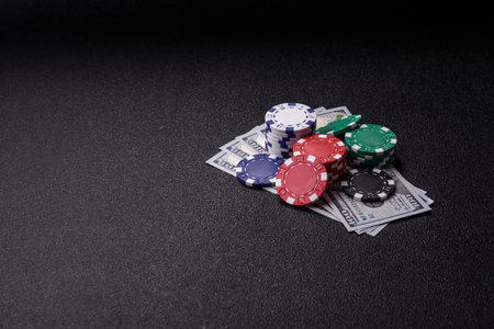 Casino chips, bets and gambling, risk to win or lose money. Betting chips as a background for your...