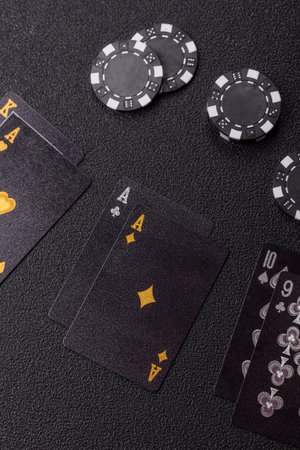 Playing blackjack or baccarat card game in casino with chips, bets and risk. Cards and chips on...