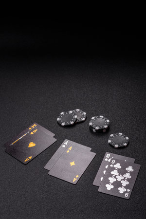Playing blackjack or baccarat card game in casino with chips, bets and risk. Cards and chips on...