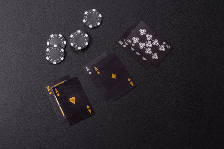 Playing blackjack or baccarat card game in casino with chips, bets and risk. Cards and chips on...