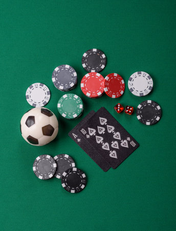Playing blackjack or baccarat card game in casino with chips, bets and risk. Cards and chips on...