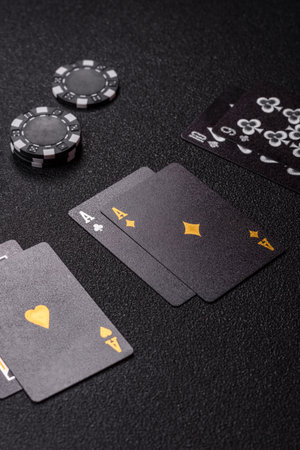 Playing blackjack or baccarat card game in casino with chips, bets and risk. Cards and chips on...
