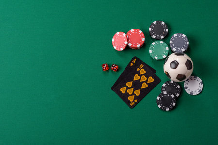 Playing blackjack or baccarat card game in casino with chips, bets and risk. Cards and chips on...