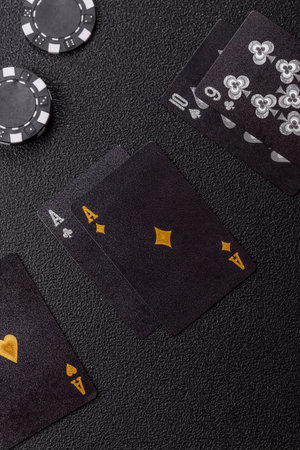 Playing blackjack or baccarat card game in casino with chips, bets and risk. Cards and chips on...