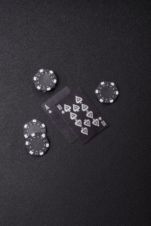 Playing blackjack or baccarat card game in casino with chips, bets and risk. Cards and chips on...