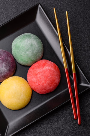 Japanese mochi, ice cream or Asian sweets made from rice flour with fruit filling. Mochi of...