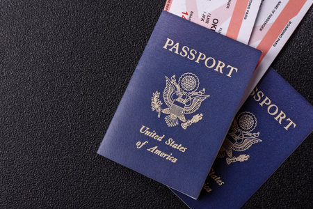 US passport or id document with tickets for flight, travel, border crossing. US passport and tickets...