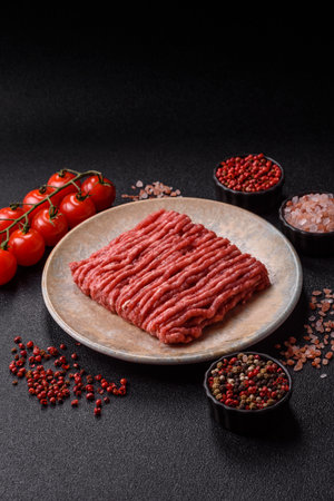 Raw minced beef or pork, ground meat for burgers. Raw minced red as food background