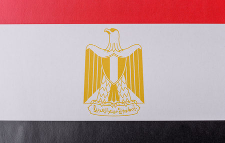 Egyptian flag in red, white and black colors as a symbol of independence. Flag of Egypt as a background for your designの写真素材
