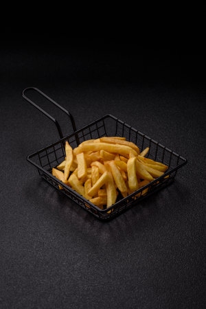 French fries, chips or snack with sauce as food background. French fries, fast food, takeaway