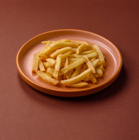 French fries, chips or snack with sauce as food background. French fries, fast food, takeaway