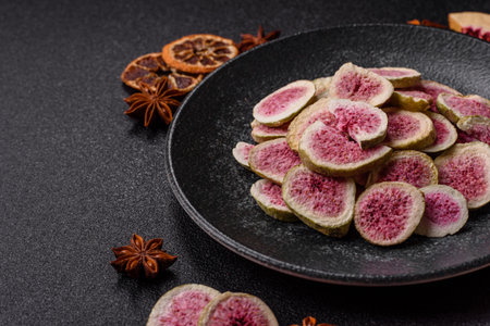 Dried sublimated fig slices as an ingredient for sweet desserts. Dried figs as a food background for your designの写真素材