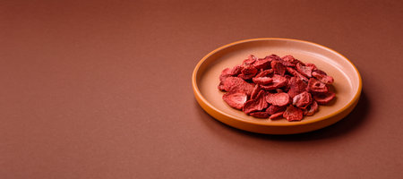 Dried sublimated slices of strawberry as an ingredient for sweet desserts. Dried strawberry as a...