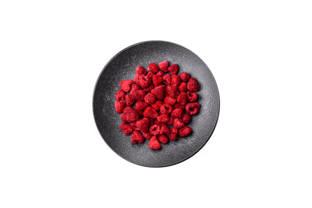 Dried sublimated slices of raspberry as an ingredient for sweet desserts. Dried raspberry as a...