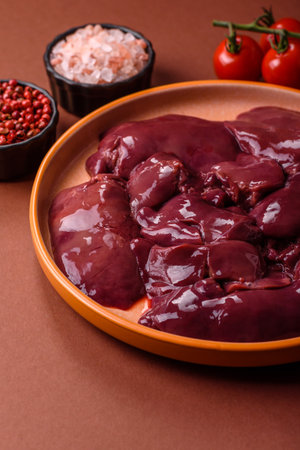 Raw fresh chicken or turkey liver, internal offal of poultry as an ingredient for cooking. Raw...
