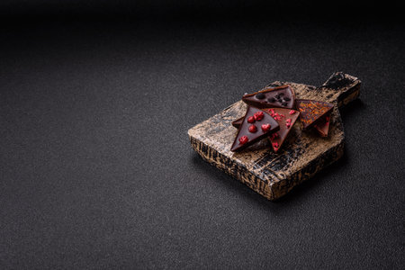 Craft home made chocolate with berries and fruits, delicious sweets. Craft chocolate as food backgroundの写真素材