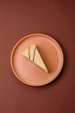 A piece of sweet cheesecake, dessert, cheese and vanilla pie. Classic cheesecake as a food...