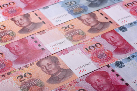 Cash, paper yuan banknotes for business transactions, financial background. Yuan banknotes as...