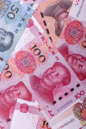 Cash, paper yuan banknotes for business transactions, financial background. Yuan banknotes as financial background for your designの写真素材