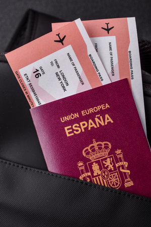Passport Spain, visa for travel, document with tickets in travel bag. Spanish passport as background for your designの写真素材