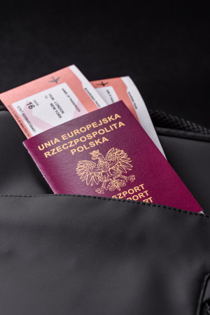 Poland passport, visa for travel, document with tickets in travel bag. Polish passport as a...