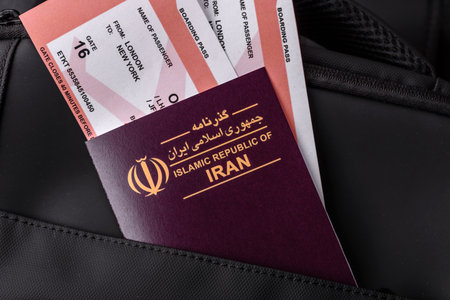 Iran passport, visa for travel, document with tickets in travel bag. Iranian passport as background for your designの写真素材