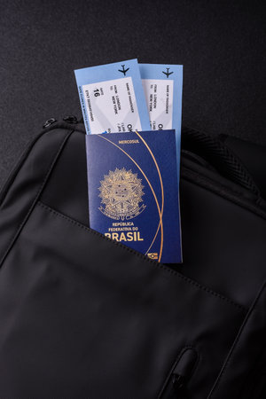 Brazil passport, visa for travel, document with tickets in travel bag. Brazilian passport as...