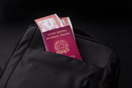 Italy passport, visa for travel, document with tickets in travel bag. Italian passport as background...