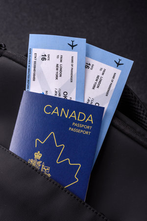 Passport Canada, visa for travel, document with tickets in travel bag. Canadian passport as background for your designの写真素材