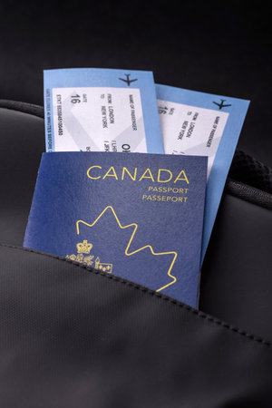 Passport Canada, visa for travel, document with tickets in travel bag. Canadian passport as background for your designの写真素材