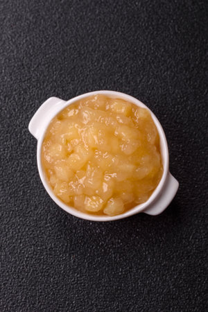 Apple sweet sauce, baby food, canned ingredient for desserts. Apple sauce as food background for...