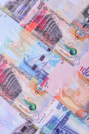 Kuwait paper money, dinar banknotes as currency for exchange or travel. Kuwaiti money as a business backgroundの写真素材