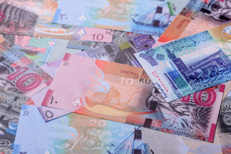 Kuwait paper money, dinar banknotes as currency for exchange or travel. Kuwaiti money as a business backgroundの写真素材