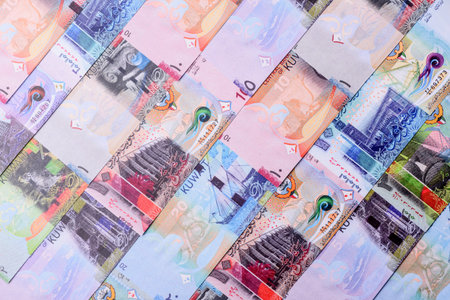 Kuwait paper money, dinar banknotes as currency for exchange or travel. Kuwaiti money as a business backgroundの写真素材