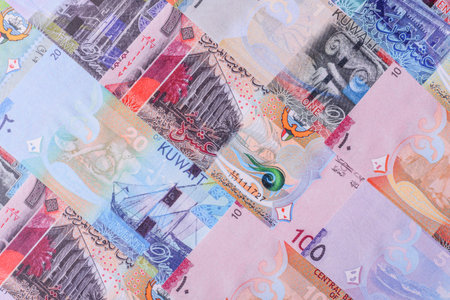Kuwait paper money, dinar banknotes as currency for exchange or travel. Kuwaiti money as a business backgroundの写真素材