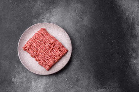 Raw ground beef or pork, fresh meat for burgers or other dishes. Raw ground beef as a food...