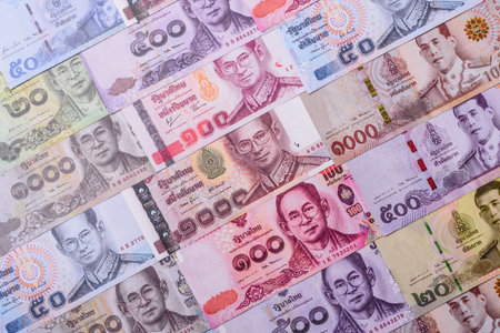 Thailand paper money, dinar banknotes as currency for exchange or travel. Thai money as a business backgroundの写真素材