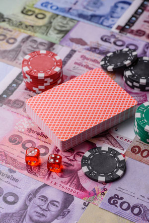 Casino and gambling in Thailand, risk to win or lose money. Betting chips as a background for your designの写真素材